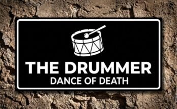 White drum and drumstick on a black plaque reading “The Drummer · Dance of Death”.