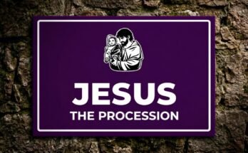 Jesus holding a child on a purple sign reading “Jesus · The Procession”.