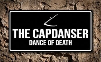 White scythe inscribed “Nemini Parco” on a black plaque reading “The Capdanser · Dance of Death”.